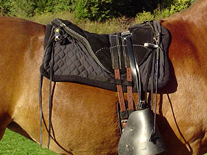 Little Joe Horse Gear standard saddle blanket. This LittteJoe saddle has been customized by the rider with the addition of saddle strings and stirrup covers.